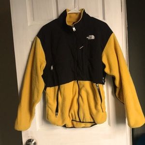 Unisex North Face fleece jacket. Good condition. Yellow and black. Large. Cozy.